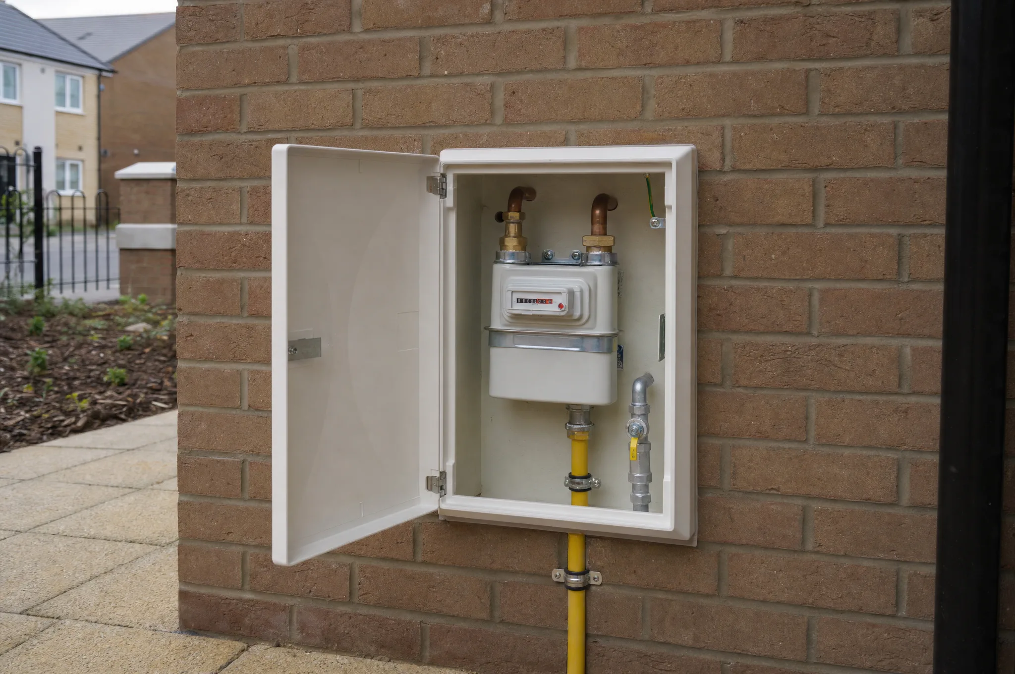 Completed gas meter installation on a UK new-build home, ready for handover