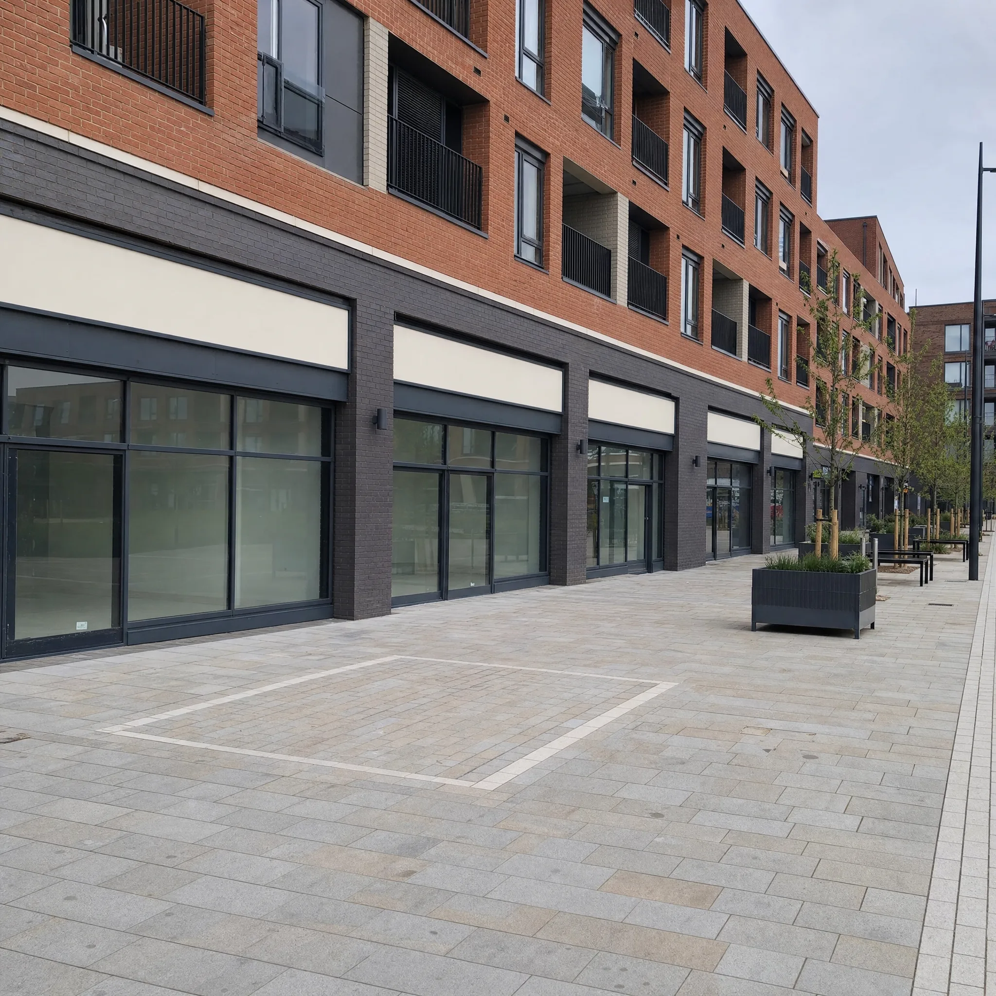 Mixed-use development with ground-floor retail beneath apartments